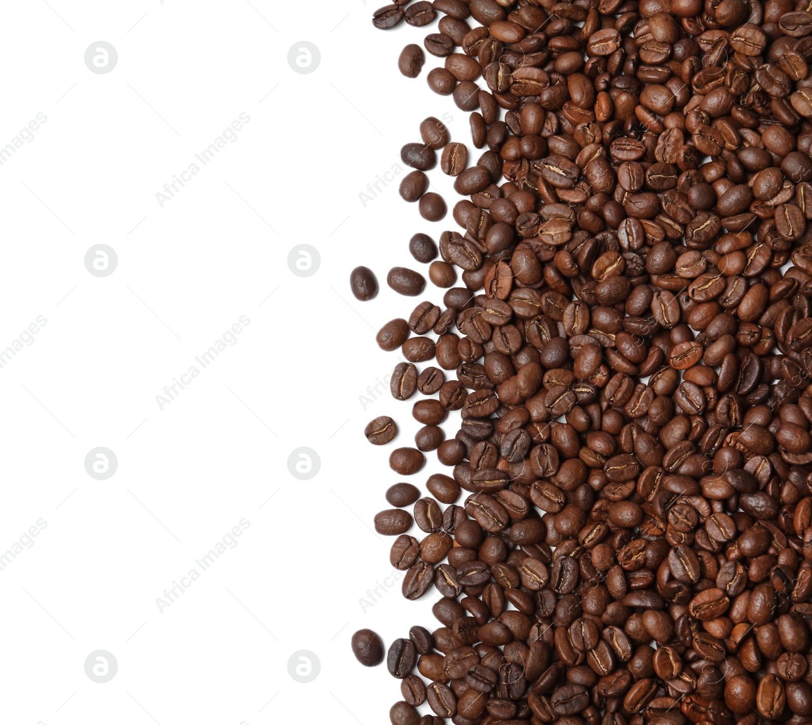 Photo of Many roasted coffee beans on white background, top view