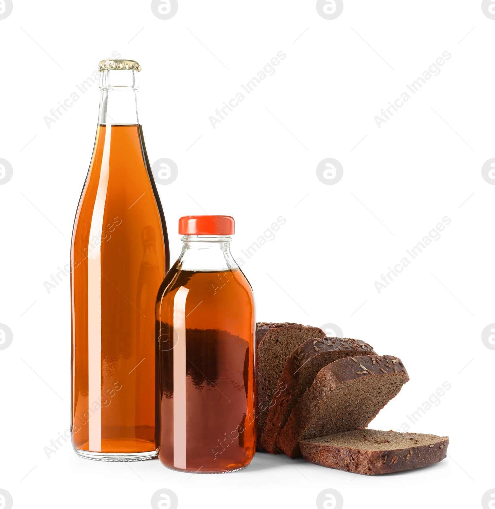 Photo of Bottles of delicious fresh kvass and bread isolated on white