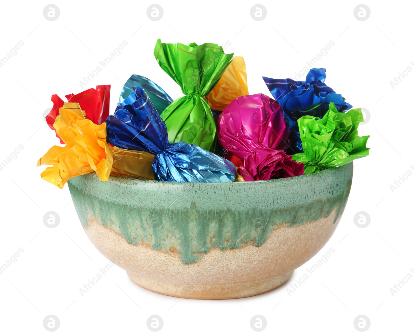 Photo of Bowl with candies in colorful wrappers isolated on white