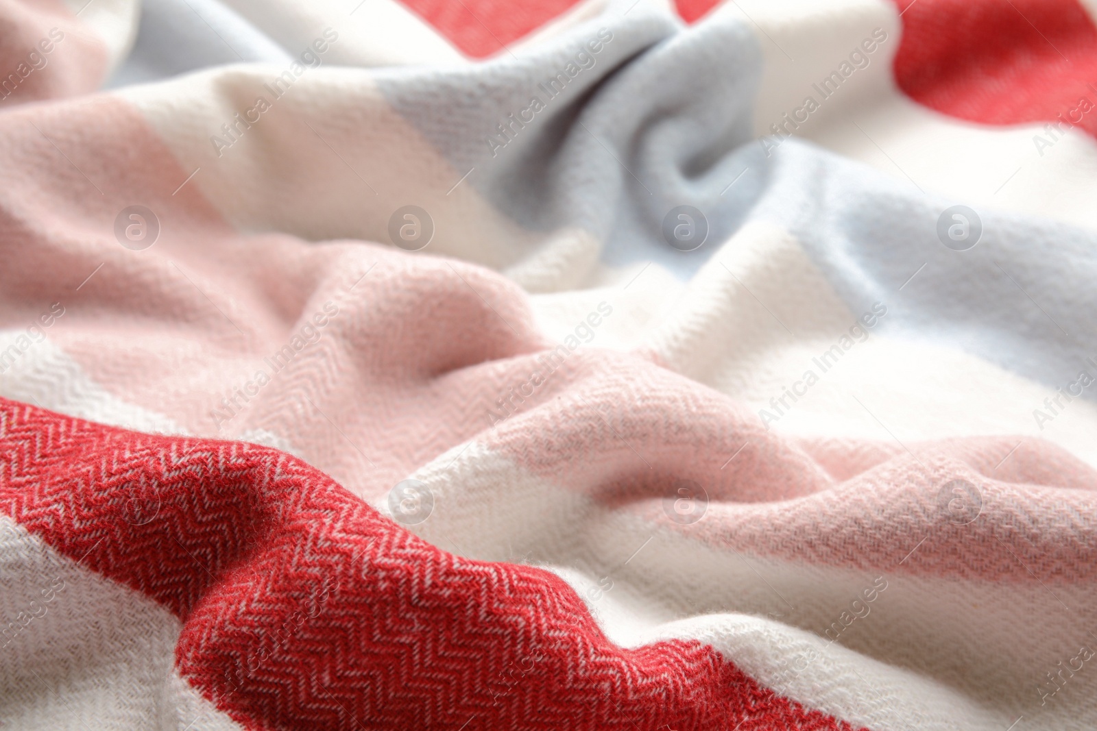 Photo of Soft crumpled striped plaid as background, closeup