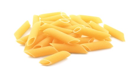 Photo of Pile of raw penne pasta isolated on white