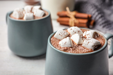 Photo of Cup of delicious hot cocoa with marshmallows, closeup