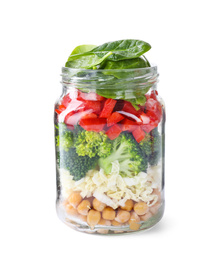 Photo of Healthy salad in glass jar isolated on white