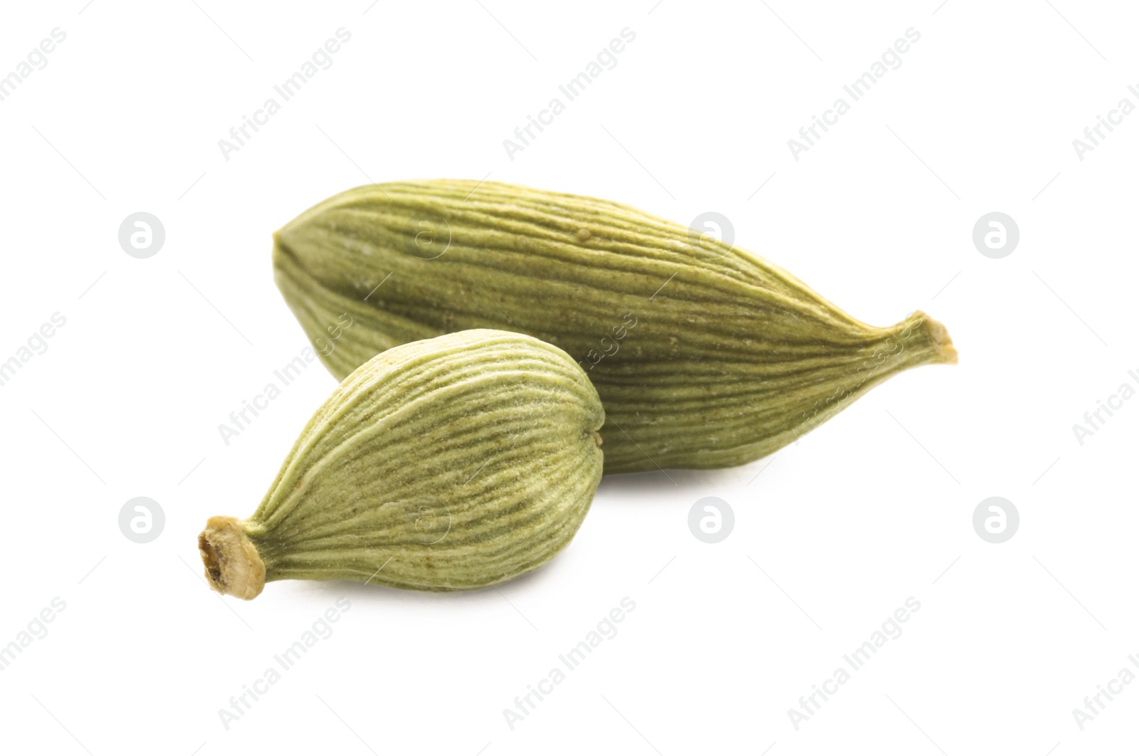 Photo of Dry green cardamom pods on white background, closeup