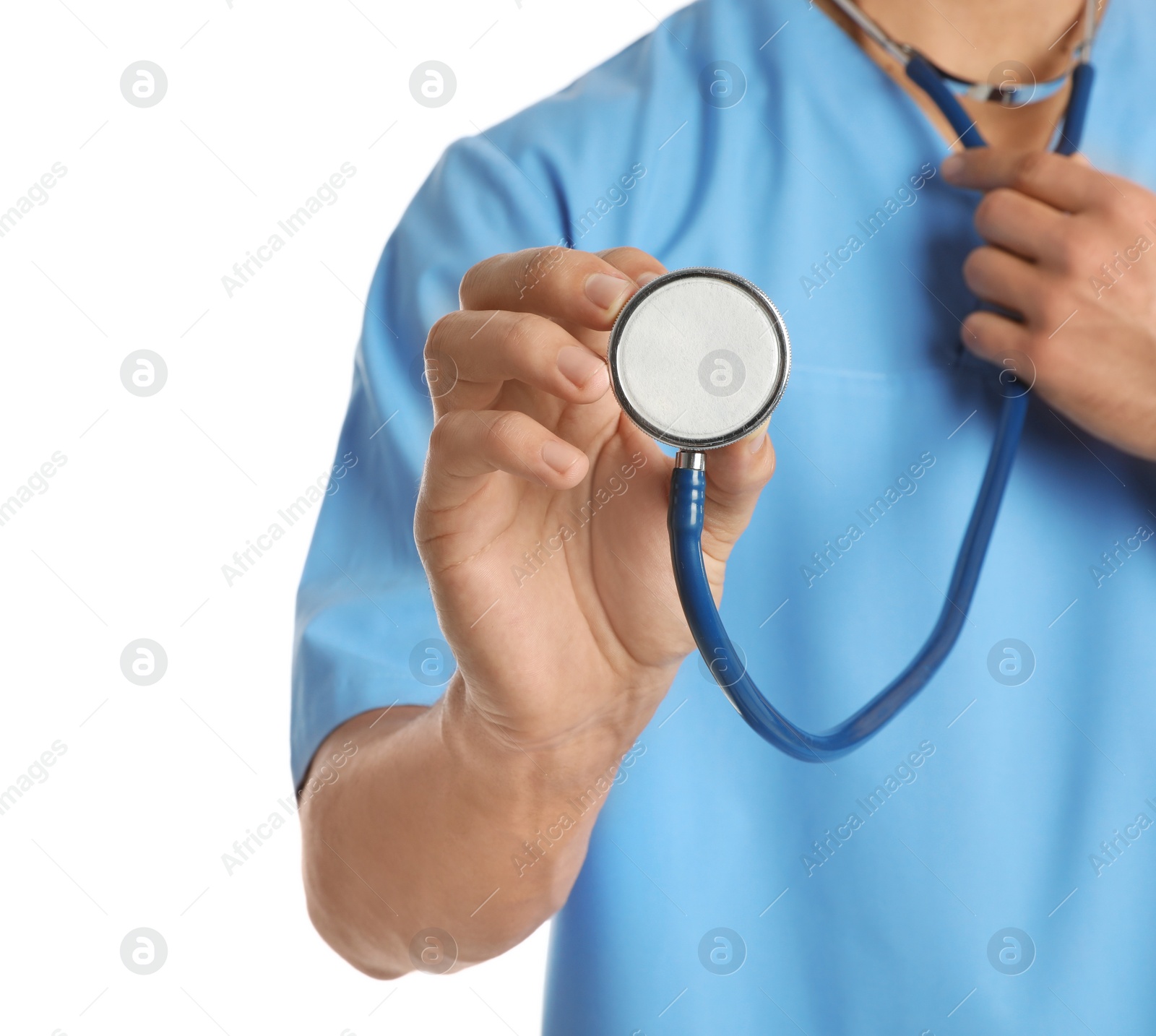 Photo of Male doctor with stethoscope on white background, closeup. Medical object