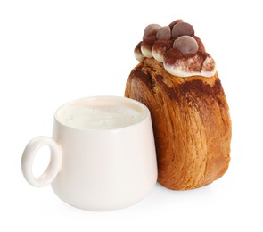 Photo of Round croissant with chocolate chips and cup of drink isolated on white. Tasty puff pastry