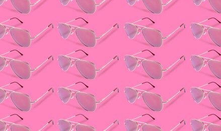 Image of Many stylish sunglasses on pink background. Seamless pattern design