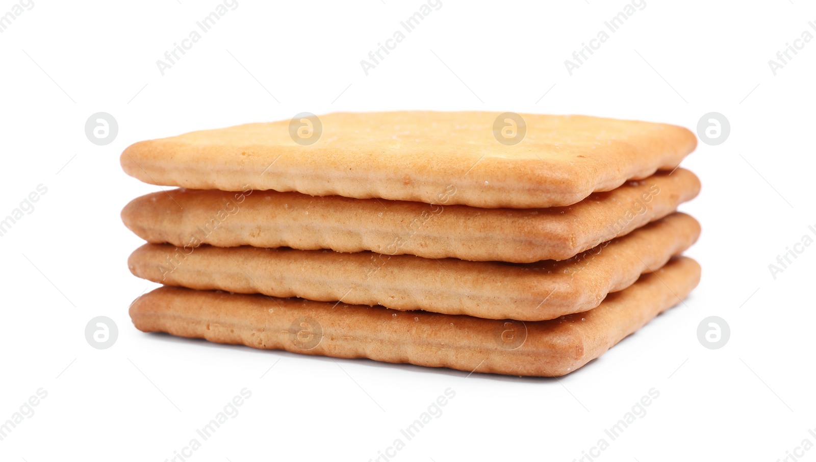 Photo of Tasty crispy square crackers isolated on white