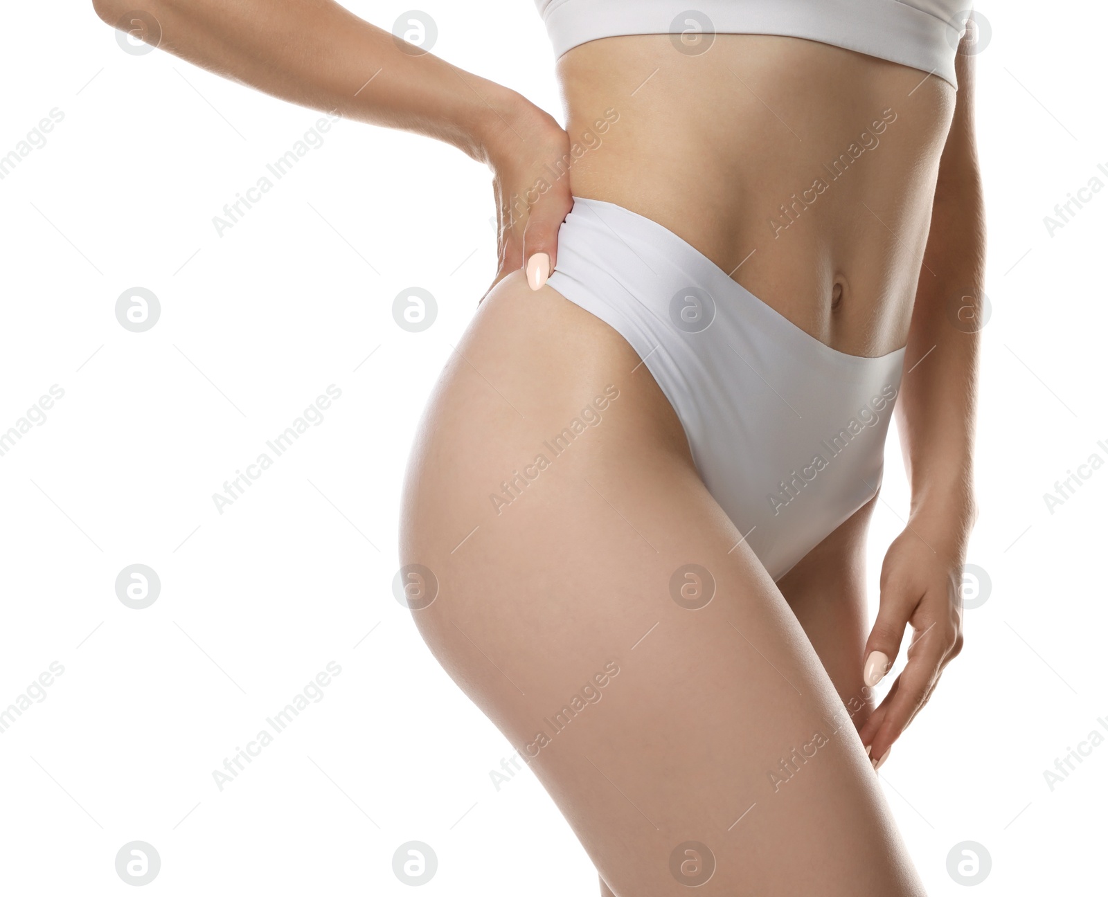 Photo of Closeup view of slim woman in underwear on white background. Cellulite problem concept