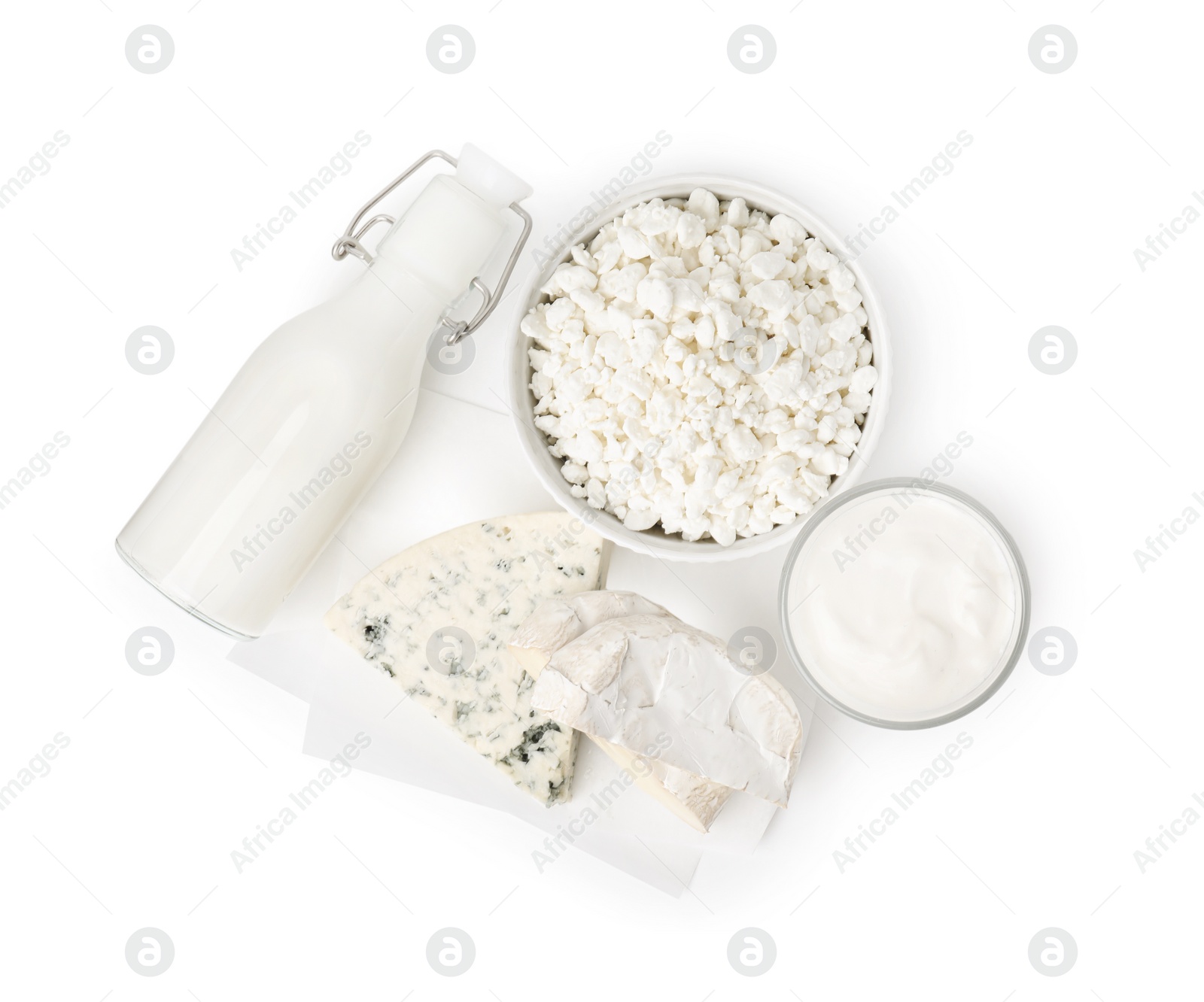 Photo of Different fresh dairy products isolated on white, top view