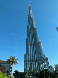 Dubai, United Arab Emirates - May 2, 2023: Beautiful view of Burj Khalifa in city under blue sky