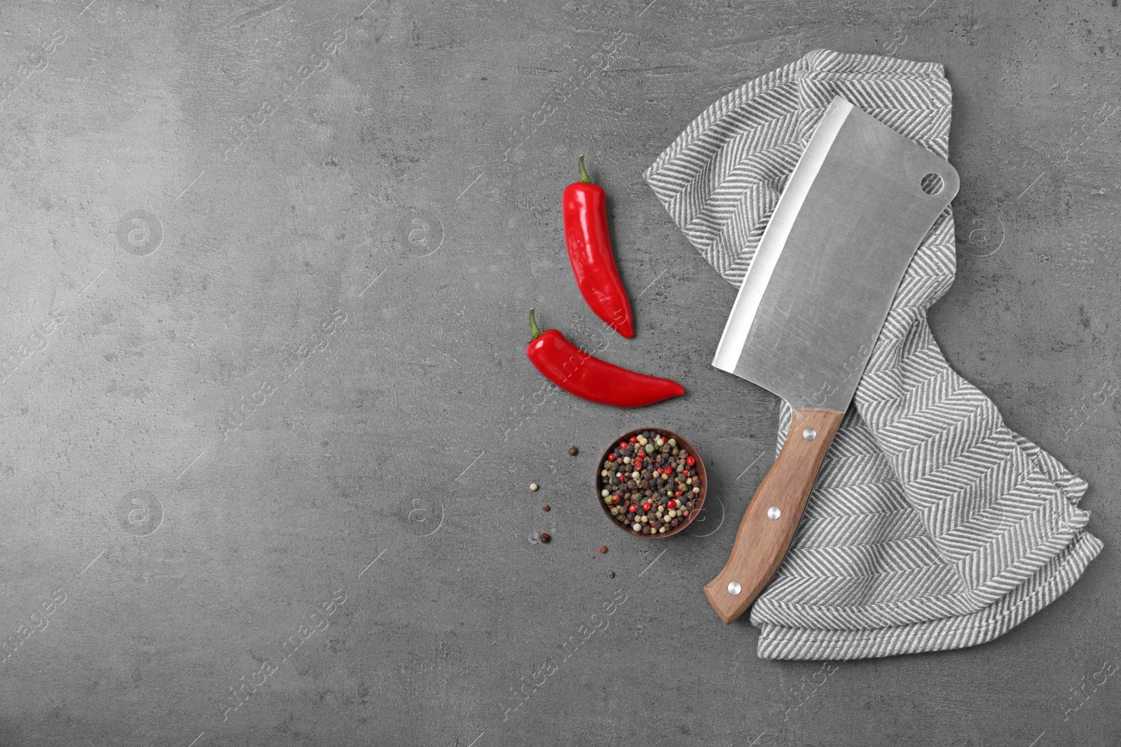 Photo of Flat lay composition with sharp knife and space for text on grey background