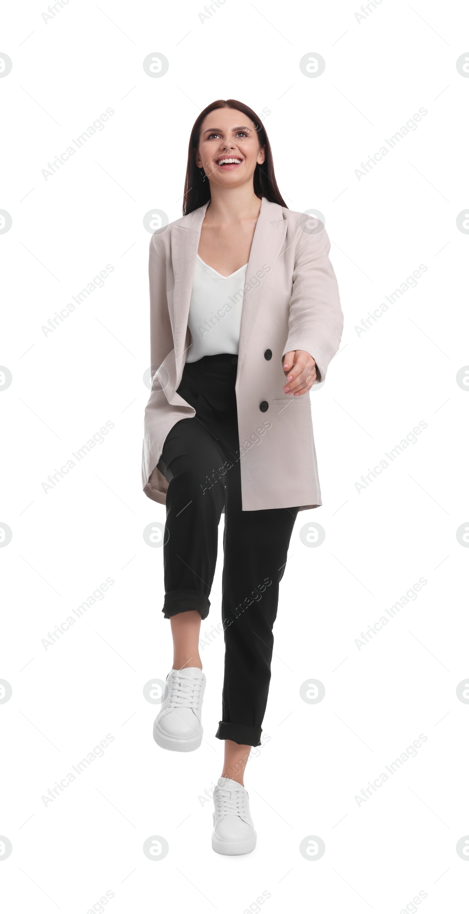 Photo of Beautiful businesswoman in suit posing on white background