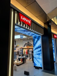 Photo of WARSAW, POLAND - JULY 17, 2022: Levi`s clothing store in shopping mall