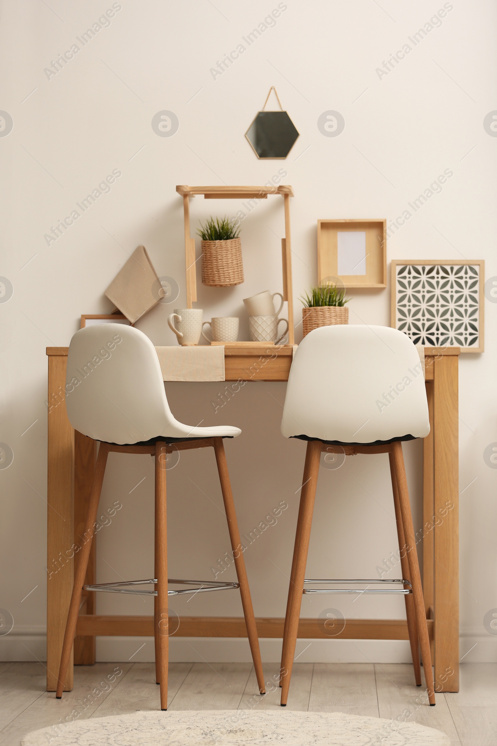 Photo of Modern room interior with wooden dining table