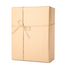 Photo of Parcel wrapped with kraft paper and twine isolated on white