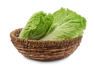 Fresh tasty Chinese cabbages in wicker basket on white background