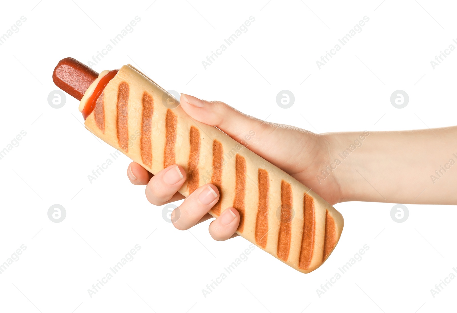 Photo of Woman holding delicious french hot dog on white background, closeup