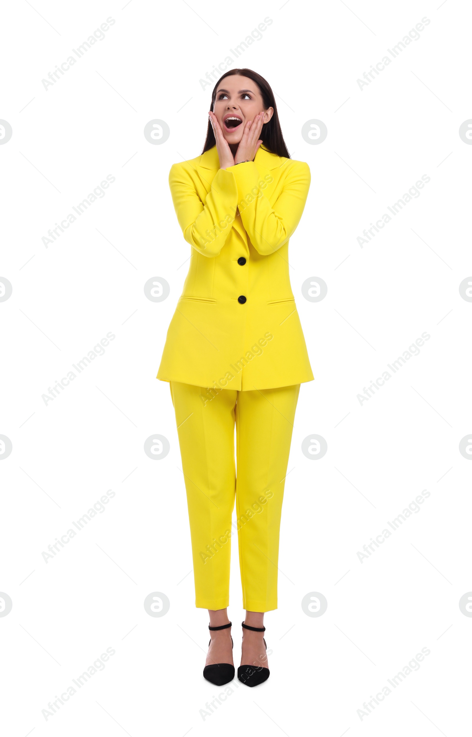 Photo of Beautiful businesswoman in yellow suit on white background