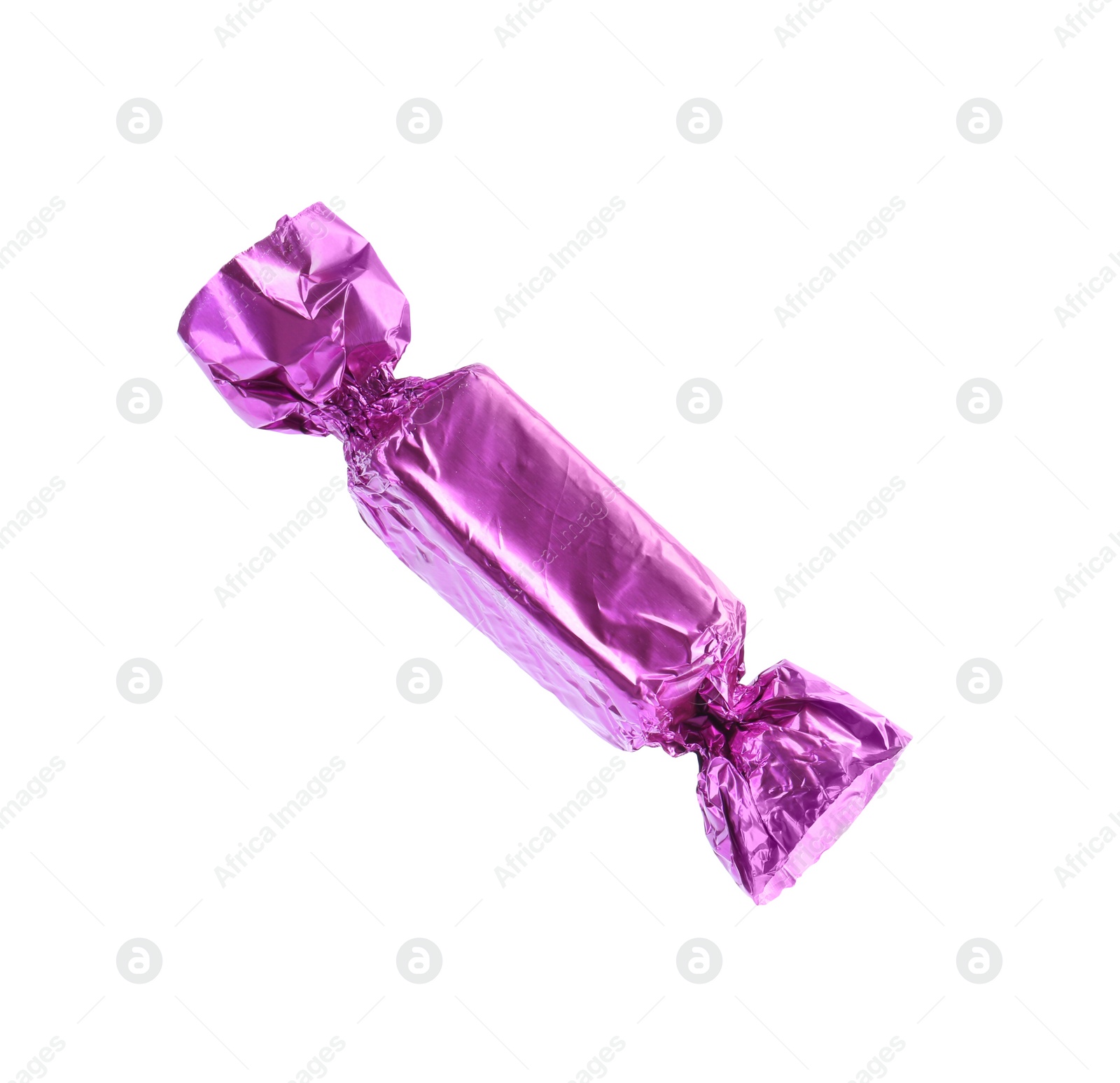 Photo of Tasty candy in violet wrapper isolated on white