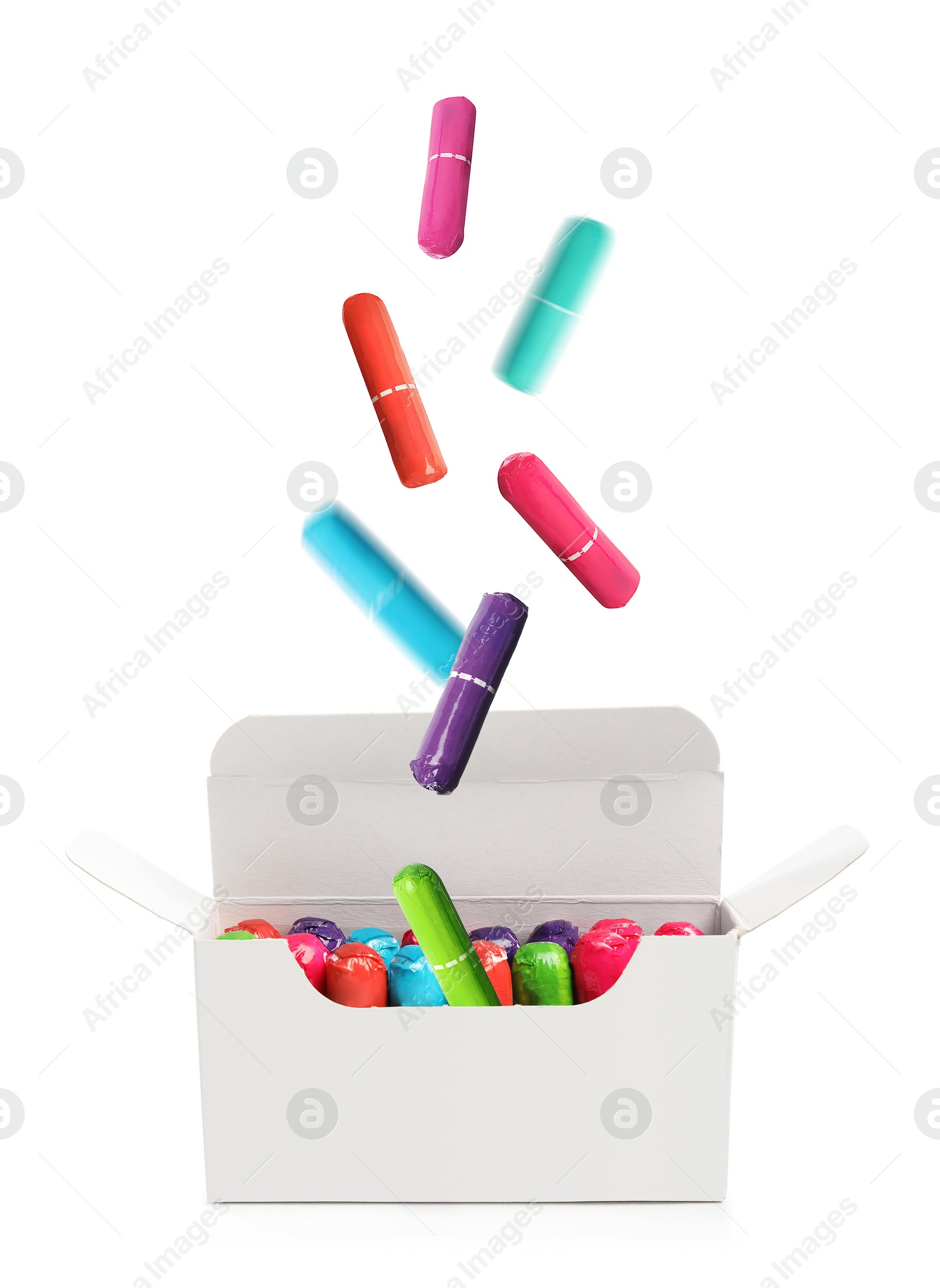 Image of Many tampons falling into box on white background 