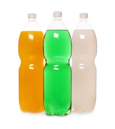 Photo of Bottles of soft drinks on white background