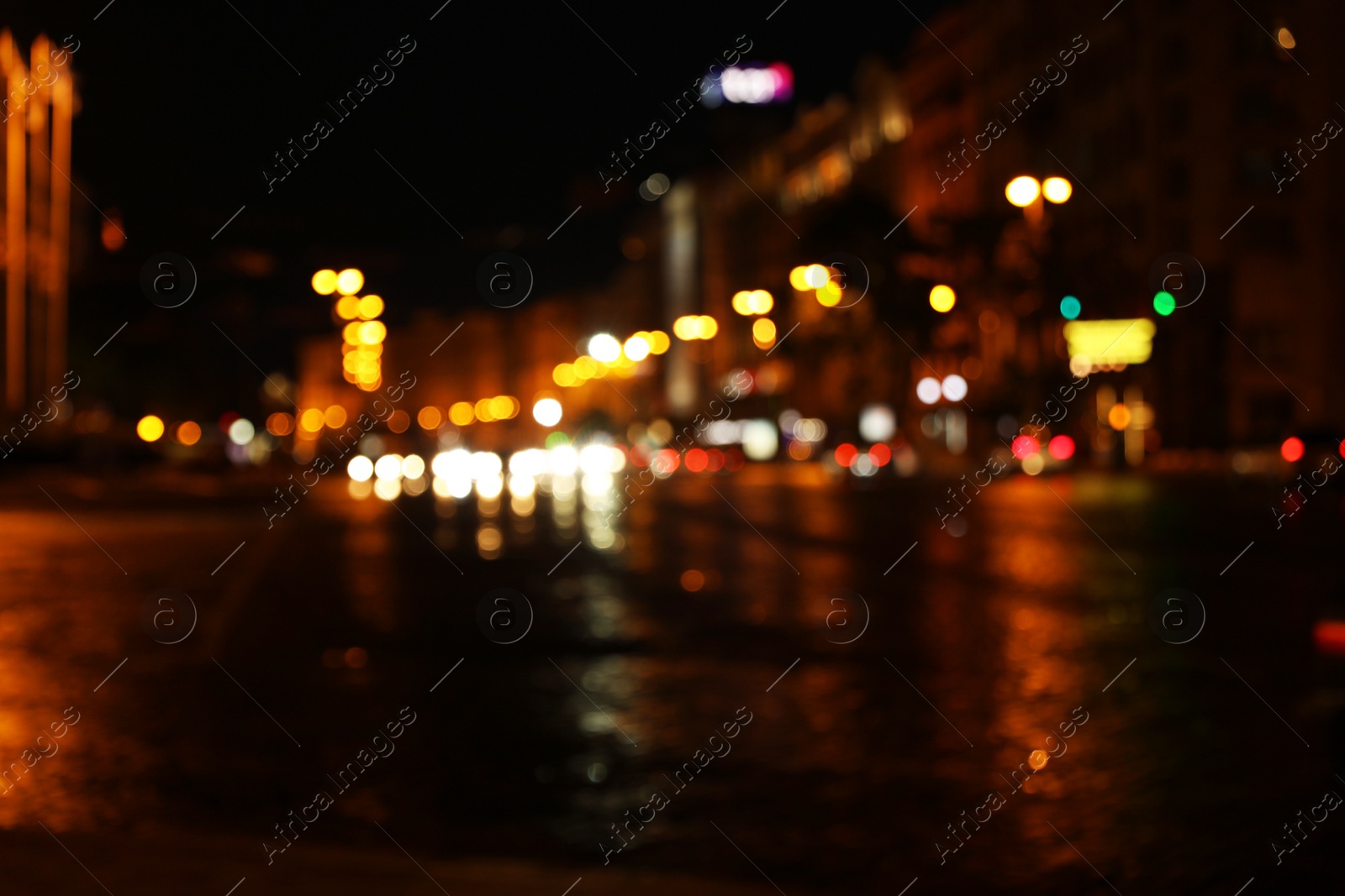 Photo of Blurred view of beautiful city at night. Bokeh effect