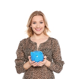 Photo of Beautiful young woman with piggy bank on white background