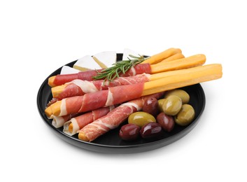 Photo of Plate of delicious grissini sticks with prosciutto, cheese and olives on white background