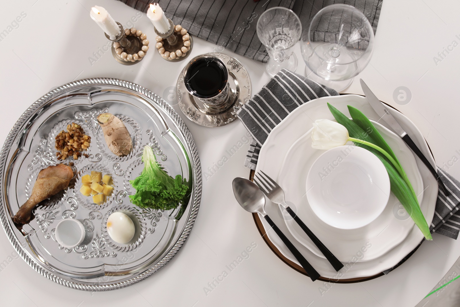 Photo of Festive Passover table setting, top view. Pesach celebration