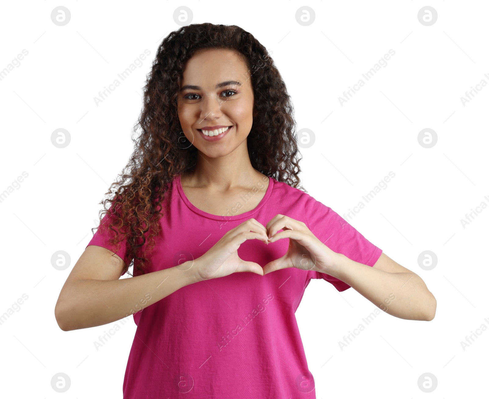 Photo of Happy young African-American woman making heart with hands on white background