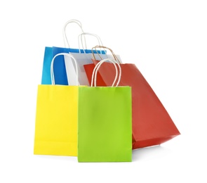 Mockup of paper shopping bags on white background