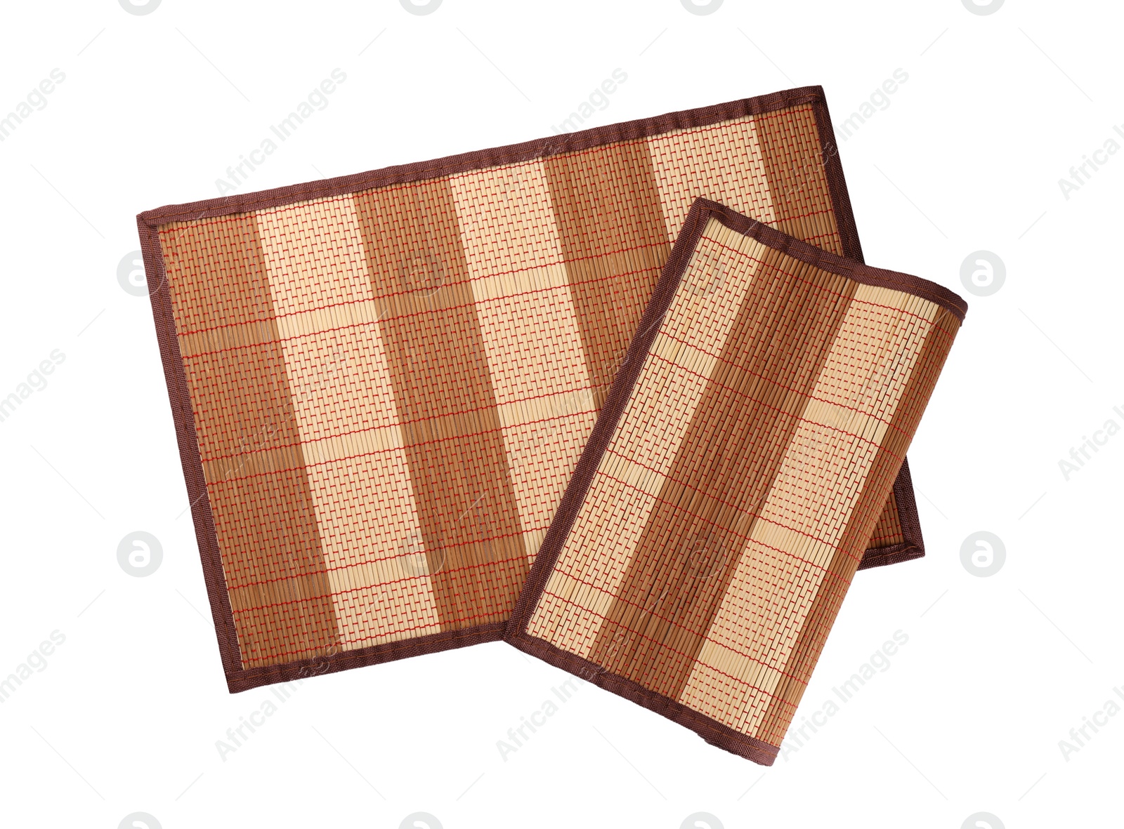 Photo of Sushi mats made of bamboo on white background, top view