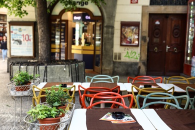 PRAGUE, CZECH REPUBLIC - APRIL 25, 2019: Open-air cafe on city street