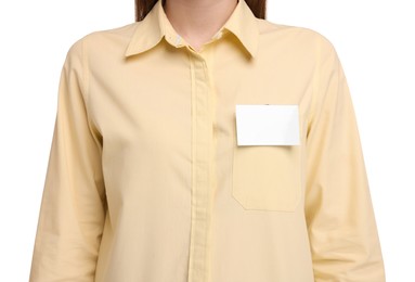 Woman with blank badge on white background, closeup