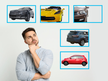 Car buying. Man choosing auto on light background