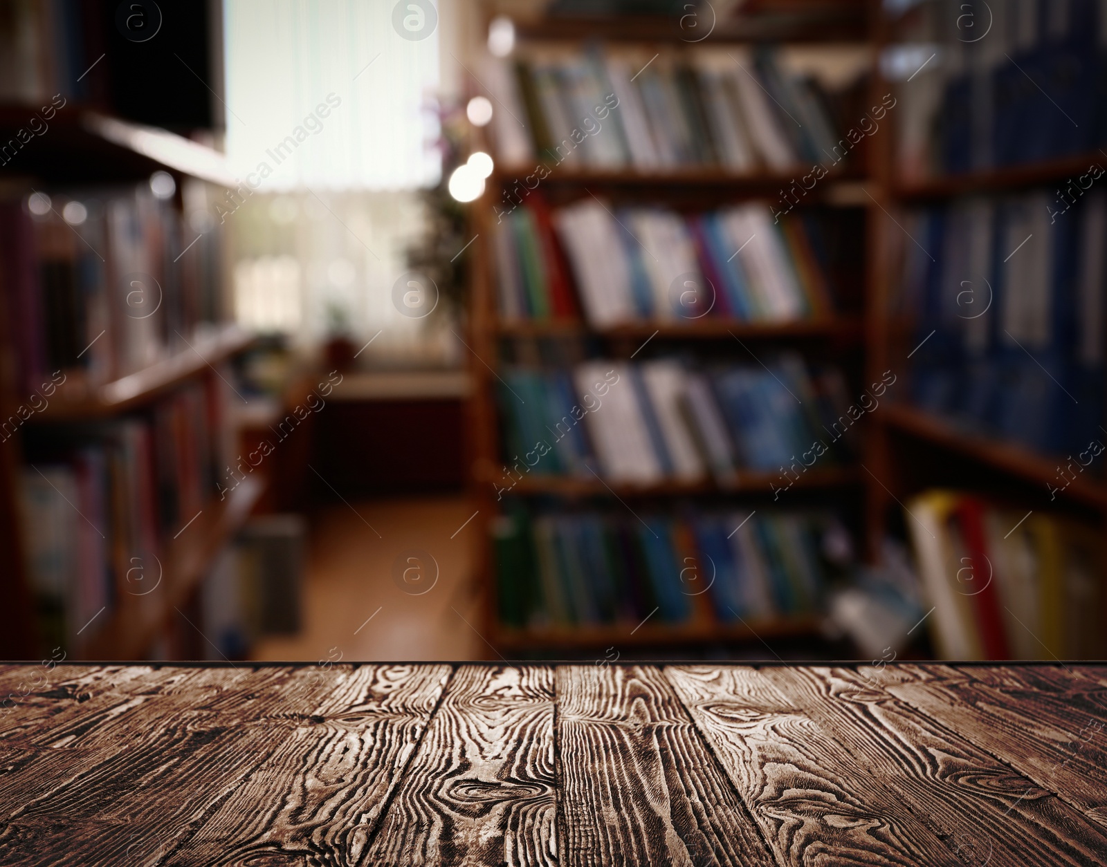 Image of Empty wooden table in library. Space for design 