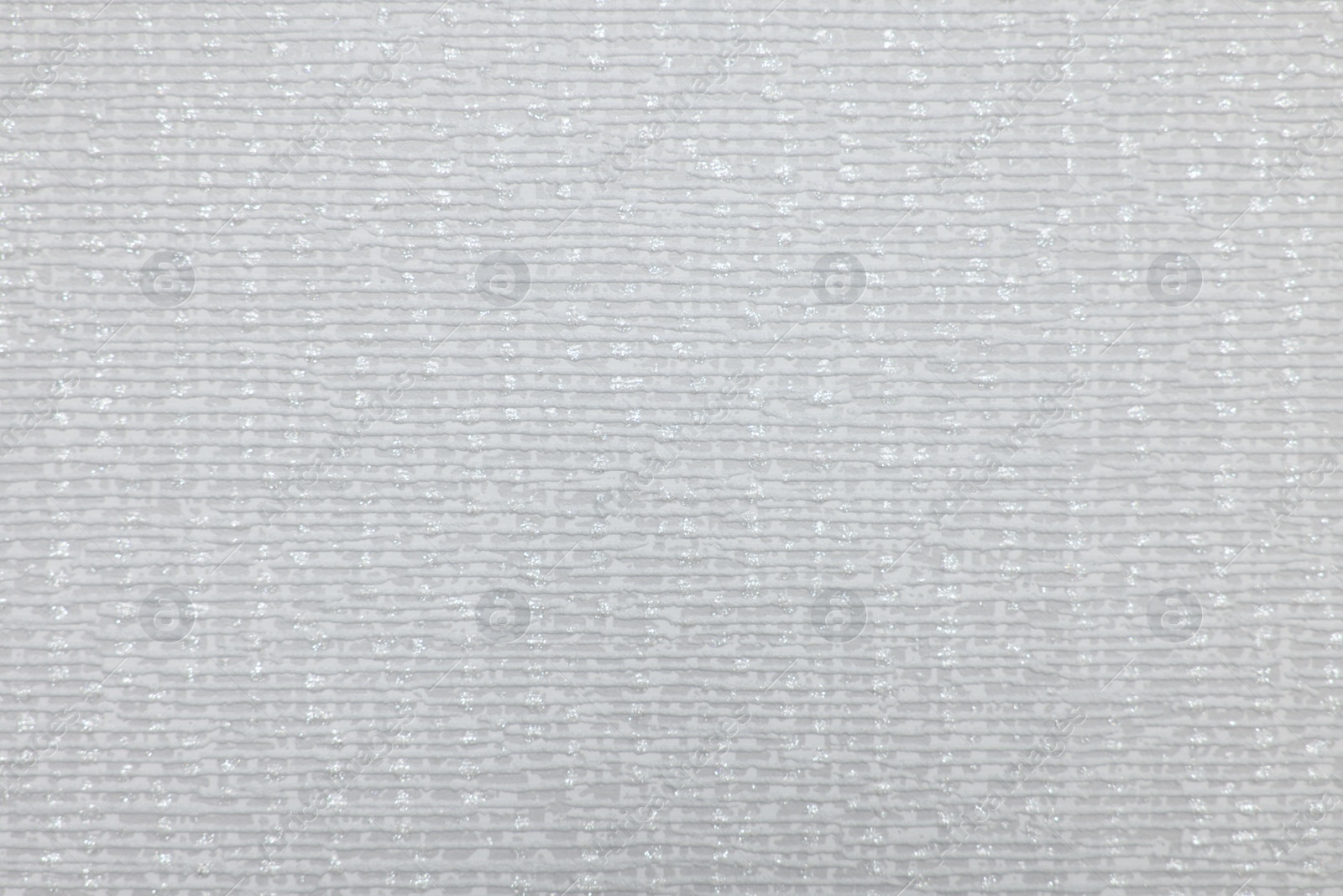 Photo of Stylish light grey wallpaper as background, closeup view