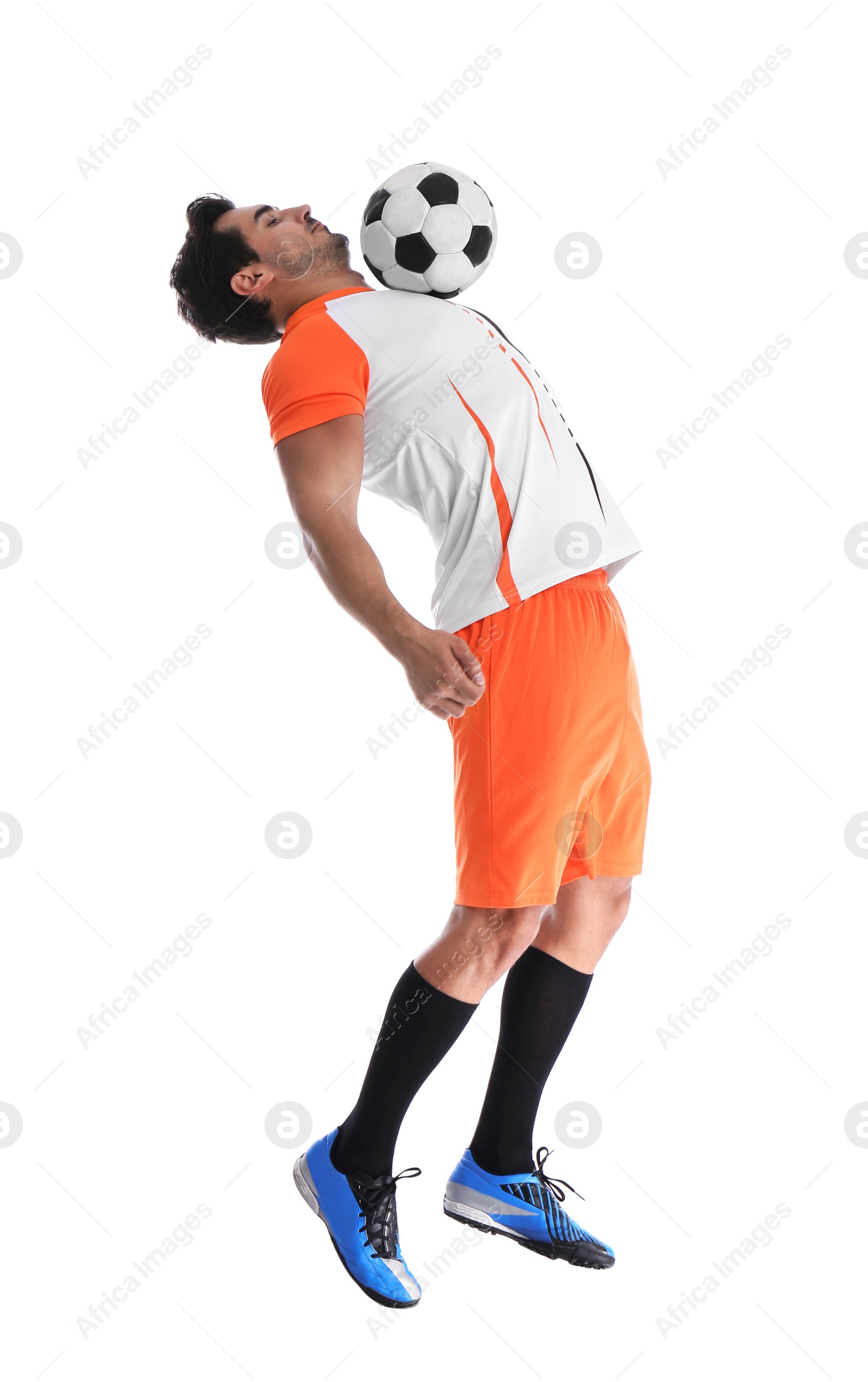 Photo of Young man playing football on white background