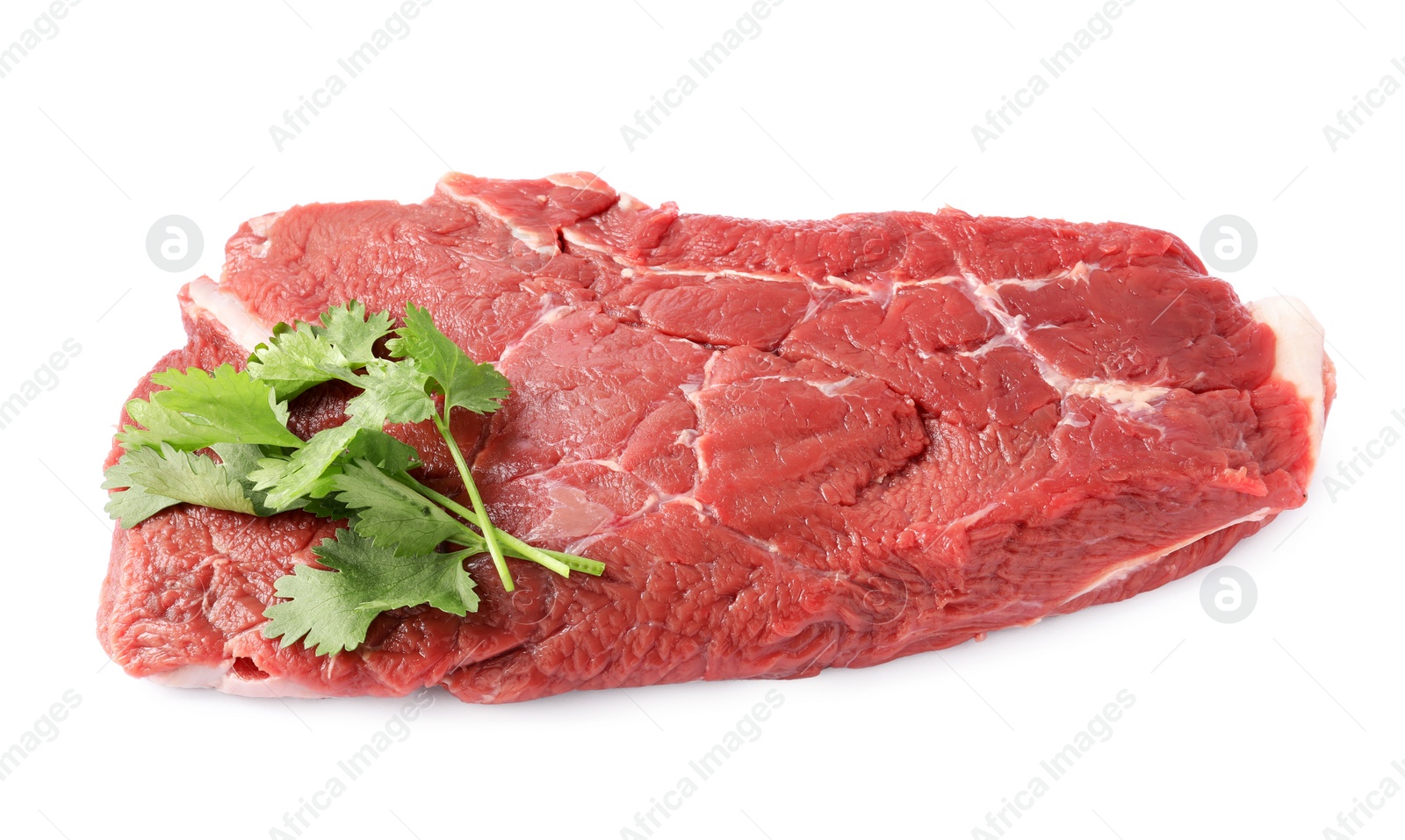 Photo of Piece of raw beef meat with parsley isolated on white