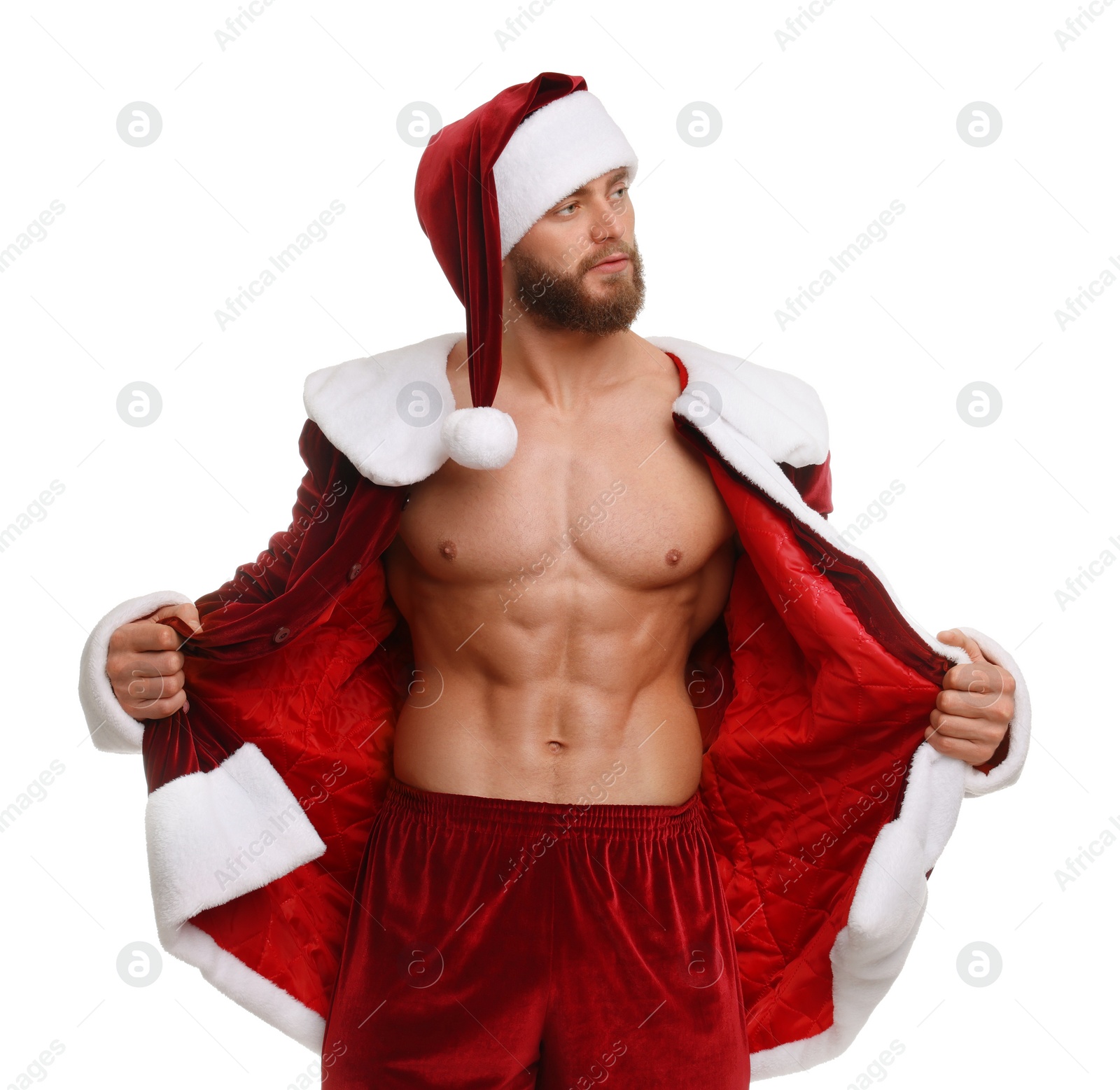 Photo of Attractive young man with muscular body in Santa costume on white background