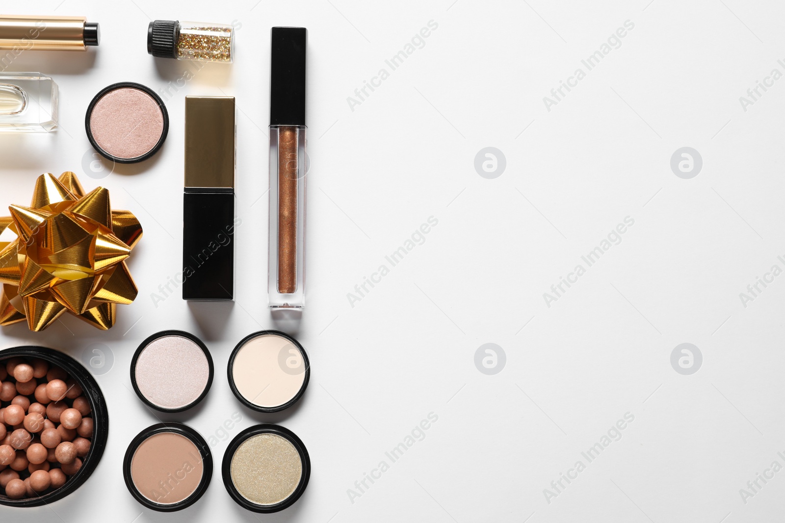 Photo of Set of luxury makeup products on white background, flat lay