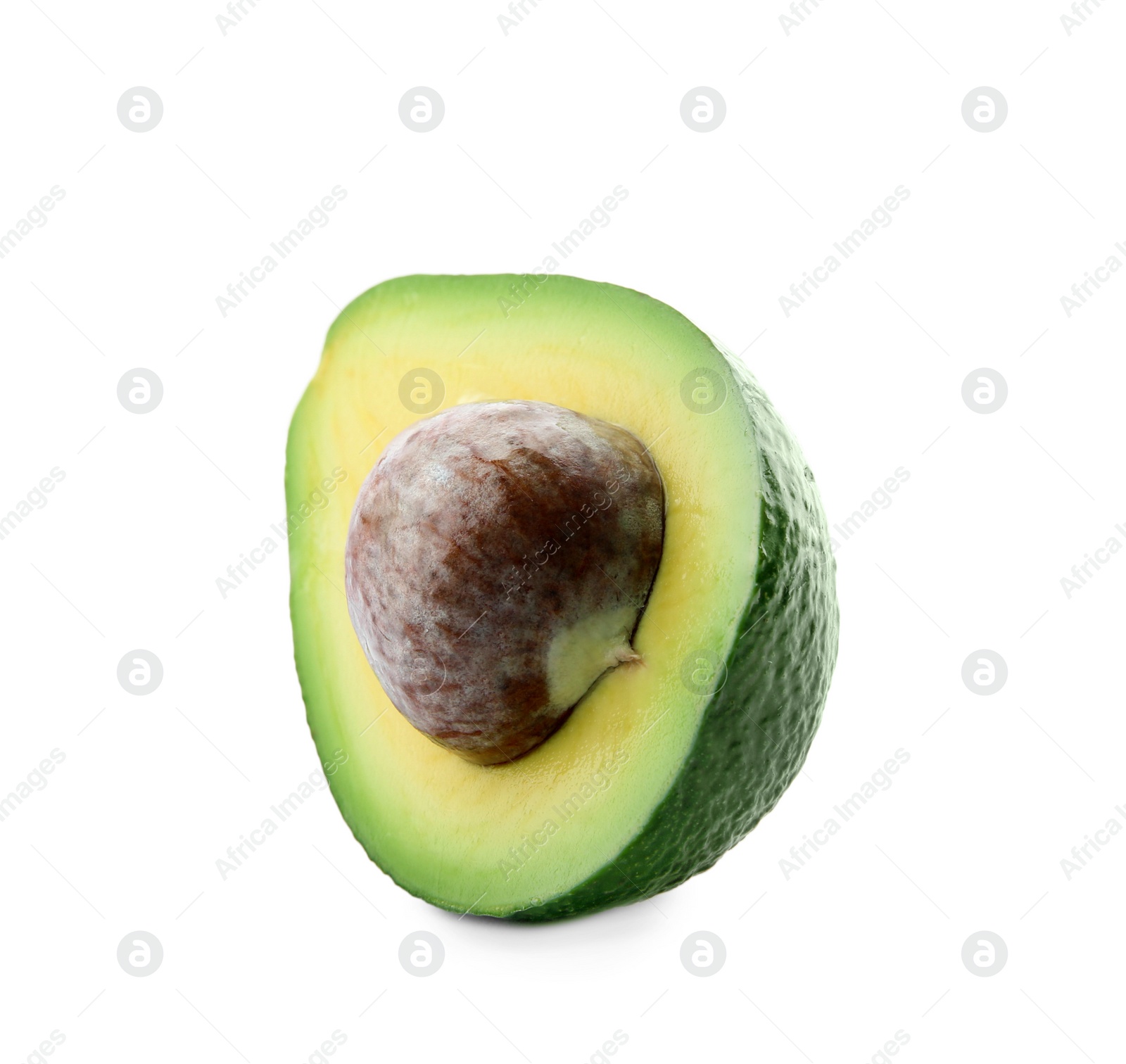 Photo of Half of ripe avocado with pit on white background