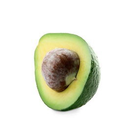 Half of ripe avocado with pit on white background