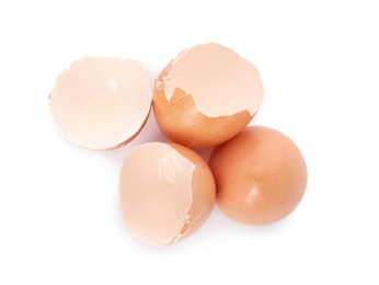 Photo of Egg shells on white background, top view. Composting of organic waste
