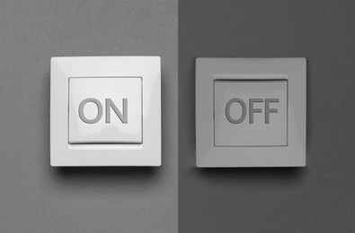 Image of Turned ON and OFF light switches on grey background