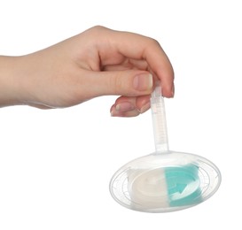 Photo of Woman holding toilet rim block cleaner on white background, closeup