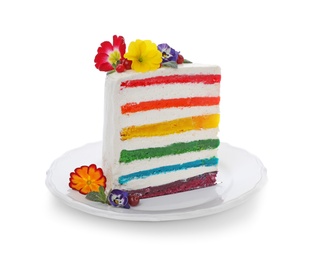 Photo of Slice of delicious rainbow cake with flowers on white background