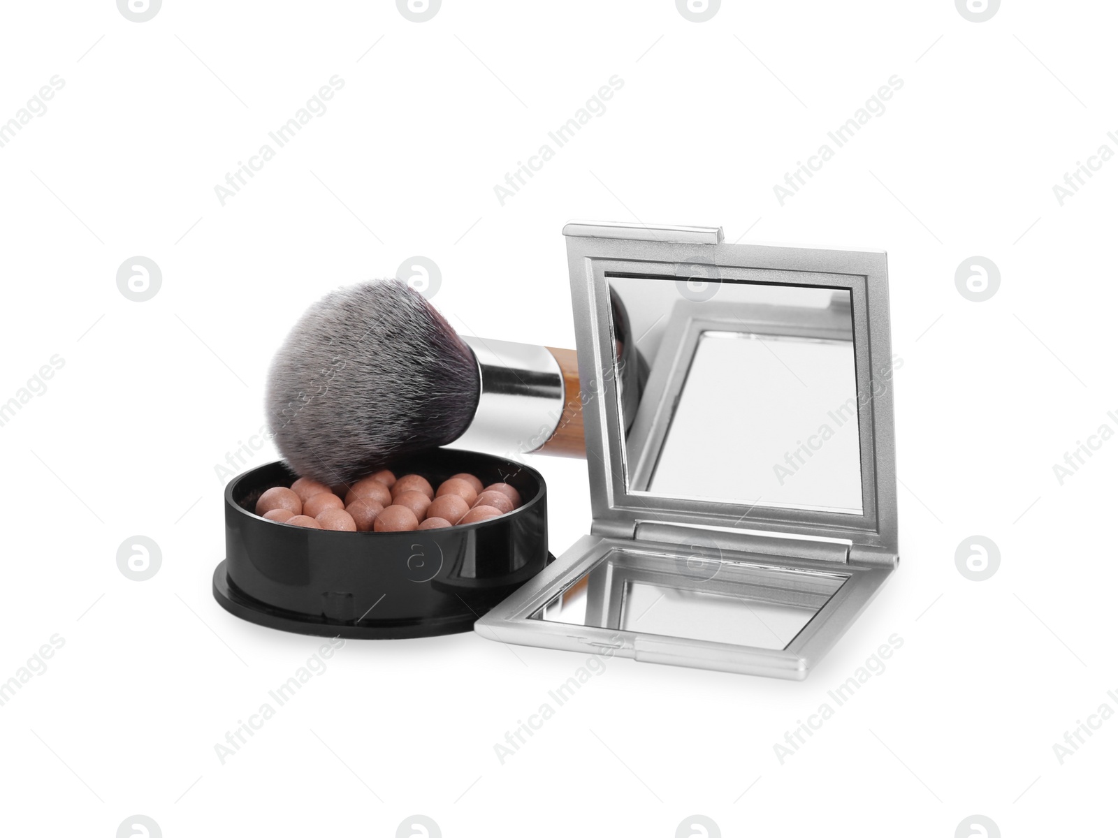 Photo of Stylish cosmetic pocket mirror, blusher and brush on white background