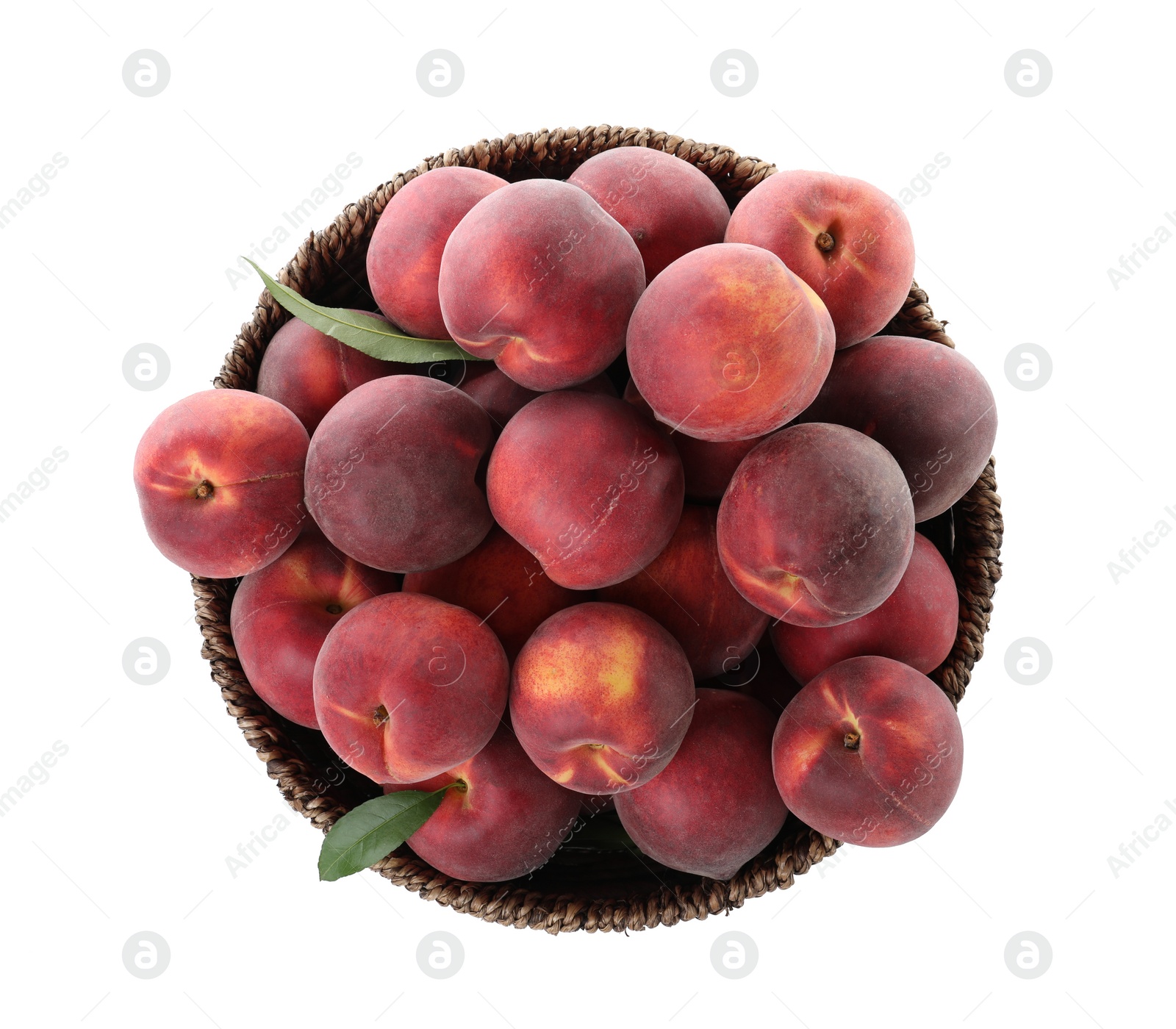 Photo of Basket of delicious ripe peaches isolated on white, top view